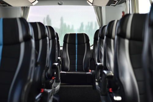 how many seats does a charter bus have