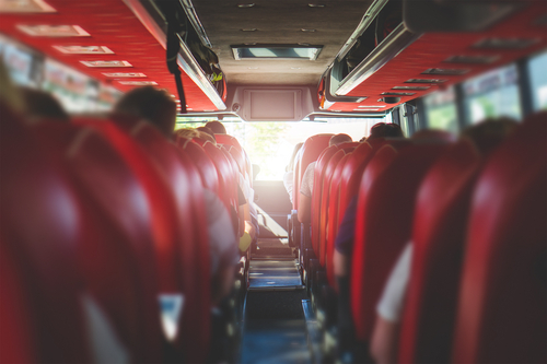 How many people can fit on a charter bus?